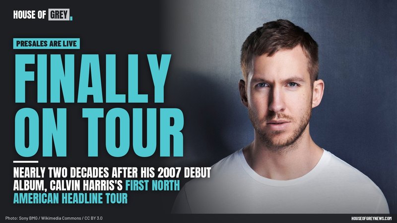 Calvin Harris with short brown hair and a white T-shirt in front of a blue-grey backdrop in his 2015 press photo
