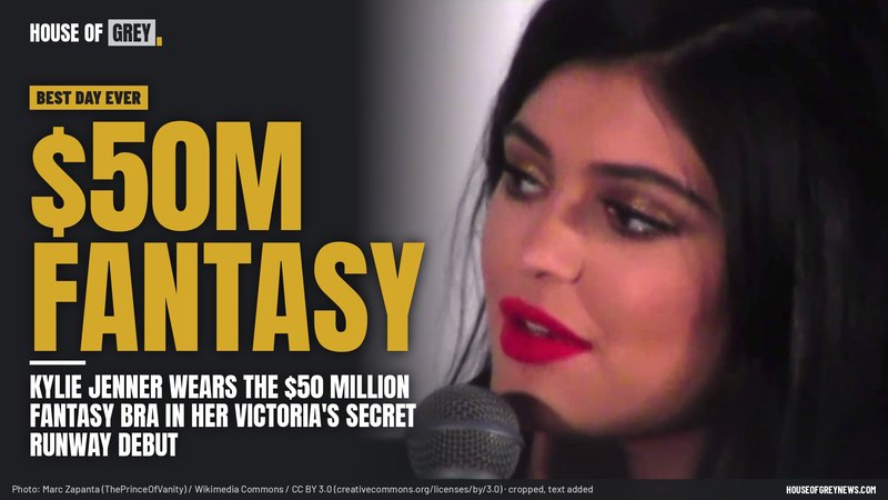 Kylie Jenner speaking into a microphone, beside gold type reading '$50M FANTASY' and the headline about her Victoria's Secret runway debut