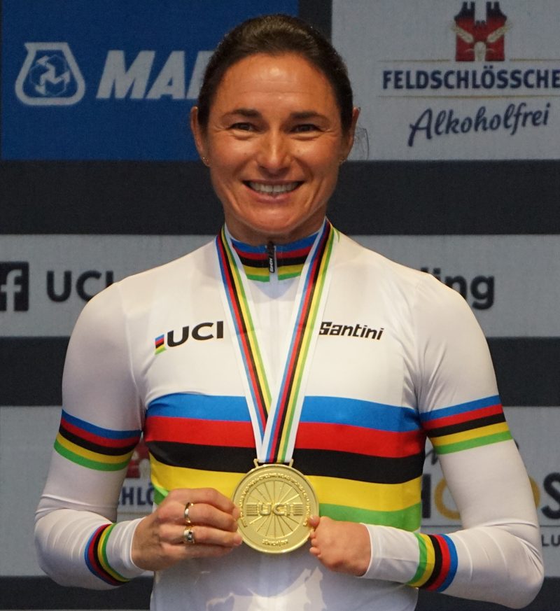 Sarah Storey smiling with a gold medal