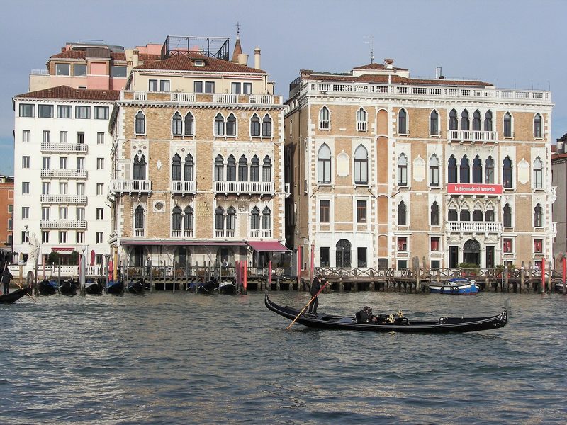Two Venetian palazzi on the Grand Canal with a gondola in front