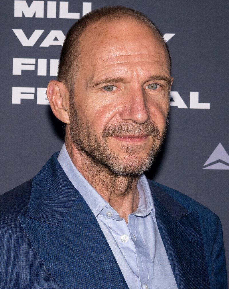 Ralph Fiennes smiling in a blue suit at the Mill Valley Film Festival